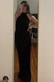 I am wearing this dress to a formal event and it is the perfect dress. The material is loose enough to be comfortable sitting and moving around in. The back is not too low but beautifully cut. The perfect flattering shape! - Madison M.