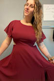 Right now it's kind of "meh" but has tons of potential. I used the "fit finder" with my information and measurements (42 38DD/34/44) and it recommended an XL. It fits great in the bust but the bottom half is extremely loose causing the back to droop at the opening and the length is more floor-dragging than floor-sweeping. I MAYBE could have gone down a size, although I think the bust would have been too tight then. The fabric is heavy and luxurious and the skirt hangs nicely. The dress is unwearable as-is, but a visit to a tailor will be stunning. - Hillary P.