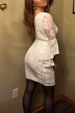 I got this in a medium to wear for my bachelorette. It was super comfortable, a little roomy, and a good length. Personally I wouldve liked it a bit more formfitting but I think the small might have been too tight. I thought the sleeves would be draping in my food at the restaurant but they weren't which was great. Only complaint is the Lace easily snagged on zippers, buttons, or Velcro. - Shannon U.
