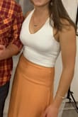 This is my first crop top and it's super comfortable and versatile! Perfect to pair with high-waisted skirt for my engagement party/fancier look and I paired it with jeans for the more casual after party :) - Elisa H.