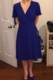 I got this dress for my engagement photos, I love the wrap style, super flattering. For me personally I fell the length is little long and hits me at an awkward spot. Nothing a quick hemming can't fix. - Emily S.