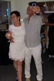 I bought the white dress and wore it for my wedding. Loved it so much I bought this blue one for another occasion. I am in my 60's so I didn't want it super tight fitting. A younger person may want the small. - Janine M.
