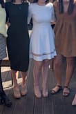 It fit like a glove. I wore it for my rehearsal dinner and got so many compliments! - Ashley E.