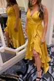 I wore this dress for a wedding and received many compliments. No alterations needed which is rare for someone short like me. High low, flows well, easy to dance in! Great purchase! - Roxanna V.
