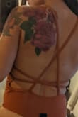 The sides gaped. I tried tape didn't work. maybe if my torso was longer? Just a weird stitch or design I guess.  Had to return even though I love how sexy it is. - Jahaira L.