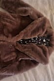 Super soft, fun coat. The lining is well done. Definitely a fluffy coat - can be hard to wear and not look like a sexy Bigfoot. Definitely adds some pounds if you have a butt, but I'm still into it though! - Amy G.