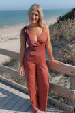 I got so many compliments on this jumpsuit! It was such a beautiful color for any time of year and for any event! Fit true to size, and was very figure flattering! - Kristina K.
