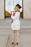 I purchased this dress for my graduation. It was perfect and got a lot of compliments on it. I'm usually a medium on everything so I purchased the medium and it fit perfect all around. You will not regret purchasing this cute dress. - Elizabeth T.