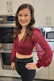 Took a chance and bought this before anyone left any reviews and glad I did! Fits true to size. The fabric of the ties in the back is so luxurious and soft and so are the sheer sleeves. My only 2 negatives are that the underwiring in the front is a little awkward and causes the fabric to bunch a little, but it's barely noticeable. Also, like the other reviewer mentioned, smaller cup sizes will have a hard time filling this out. There is no padding to provide any lift or "help" for these B cups haha. Also, did have to wear petals with this, (it is see through) but no big deal! - Skyler S.
