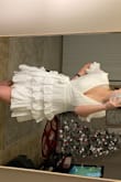 I love the fabric and fit of this dress. It is a little loose all around, and pretty low cut on me. But nothing some fabric tape or a stitch can't fix! Will need to be ironed/steamed. Mid-thigh length for me. Came very quickly. - Rachel H.