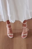 True to size, I'm usually a size 6 but when I order shoes online I always order size 6.5 to be safe, and they fit perfectly! If you are true to your shoe size it shouldn't be an issue, but if you fluctuate shoe sizes just go up a half or full size. Don't worry, their return policy is AMAZING! I had standard shipping, and it came to my house pretty fast! Love fast shipping! The quality of the heel is perfect, especially if you are looking for a petite heel that gives off a sexy look. The wrap-around string has a nice texture that doesn't feel cheap, and is adjustable! Make sure your feet are clean, you will see your toe marks. Overall, I'm OBSESSED! If you want to see a try-on review, please look at my TikTok @syleenas! - Syleena L.