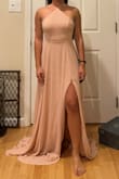 Finally found the dress to wear to a friend's wedding after weeks of searching. It is very flattering for a small chest, and the low cut on the sides of the boob isn't as daunting because there's not much there. :) I love that the straps are adjustable and the slit of course is flattering as well, especially for my height. I am usually a size 4/small but the small was way too loose on the bust area, about a full 4-6 inches if I had to take it in to be altered to fit my ribs. So the XS was what I went with! - Nicole S.