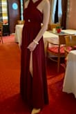 I am absolutely in love with this dress!
The dress fit perfectly. I bought size S. There was still space in the chest area even though I wore a strapless bra underneath.
Color was just like in the picture, red wine with the cooler undertone.
I made a slit from the middle of my thigh because I felt too covered in it.
Besides the small alteration I made I would totally recommend the dress, it was definitely flattering for my body shape (would recommend getting it shortened for someone who is smaller than 5'8 or not wearing heels). - Mirna S.