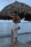 The dress is perfect if you want to look sexy and elegant at the same time. It shows the whole back which is great. Make sure to tighten the strips so that the chest does not show. I got a pair of silicone breast stickers to be safe. The fabric is very good. I loved the dress. - Angie V.