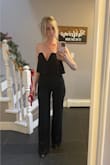 This by far is my favourite jumpsuit that I've ordered from Lulus. The material is stretchy and comfortable and doesn't fall down in the bust area. I loved it so much that I just ordered it in emerald green. - Jill B.