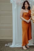I wore this to my friend's wedding and got so many compliments. This dress is a little long for me since I'm on a petite size. The dress looks more gorgeous in person. - Dinh T.