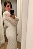 I love the dress! It's so comfortable and beautiful!!! It fits well in my arms but is a little bit big in my waist but I just need to fix it. I wouldn't change the size. It's perfect and the back part is beautiful! I'm so so so happy. I bought my wedding dress for the courthouse here in March and now for the church. The price was great also! - Agostina D.