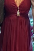 I ordered the large - but took it in to have the length shortened & the bust area was taken in. (Alterations were $115 which was more than the dress) I received a ton of compliments and it was very pretty & looks as nice on as it does in the picture! VERY happy with this dress. :) - Michelle C.