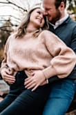 I wore this sweater for my engagement photos in the fall, and it fits beautifully! So classy and stylish, the design of the front came across beautifully in photos and kept me surprisingly warm! I was so happy with this sweater!! - Emma B.