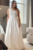 This dress is so beautiful in person. It's so elegant and is very good quality! I ended up choosing a sparkly dress but this was a CLOSE second. And it has pockets! PS. It fell off the hanger in the bag and I didn't know so please disregard the wrinkles. It has very nice pleating! - Marissa C.