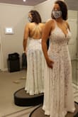 At first, I felt awkward a little because it's a monokini with lace, which is pretty different from a "normal bridal gown". So the photos show your legs as a silhouette. But actually, I like it a lot. I had to get it hemmed and tighten the straps but I loved it overall. - Taylor M.