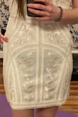 The pattern is beautiful and I would say this dress fits true to size but was too big for me. I'm normally a small but was hesitant to would be too tight. The bottom half fits perfect if you're curvier on bottom but the waist is too loose. There was about an inch on either side that stuck out b/c it's shaped to create a waist. Also don't wear dark underwear as you can see... - Megan M.