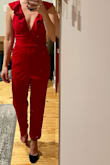 I really wanted to love this, however, the fit was a little strange on me.  This was super tight in the booty but very baggy in the front area.  The ruffle top was very pretty on, just a little big in the cups (I have a small chest so could have made that part work) the cut of the legs was great and I only would have had to hem them slightly. (I'm short so usually have to hem everything). The color is perfect for the holidays!  Sadly I ended up having to return this because of the fit in the front area. - Amanda W.