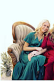It was a little loose, especially in the bust but I wouldn't size down. It was a gorgeous color. - Amanda E.