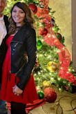 I ordered a size up from reading the reviews and it fit perfectly. I love this jacket! - Swan P.