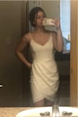 I really love this dress, cuter than I thought! It is a bit big though, the straps aren't adjustable and kinda fall off. Will be exchanging for a smaller size! Also the white isn't see-through at all. I'm wearing a black bra and you can't even tell. - Canvas S.