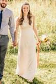 I got married in this little beauty last year and it fit like a GLOVE. It was pretty long on me (I'm 5'1) so I had to hem it up about 6 inches, but fit everywhere else perfectly. Very comfortable and lightweight! Be sure to have a steamer handy-- the fold wrinkles from shipping didn't fall out on their own. - Julia S.