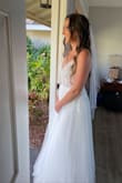 LOVED this dress! I wore it for my wedding and it was perfect! I recommend buying a size larger than you normally wear, since it runs small. I'm usually always a medium or size 6 in Lulus clothing, and I had to get the 8 in this dress. Such a great price for the quality of the dress and I got so many compliments! Highly recommend:) - Kasey V.