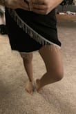 I love this skirt, it is so gorgeous! Fits perfectly. My only issue is that the tassels on the bottom layer do not go all the way around the hem, and so when I move my leg slightly you can see where the tassels cut off (pictured). I just wish the tassels either went all the way around or the skirt was tacked together at the spot so that you couldn't see where the tassels end. - Maria C.