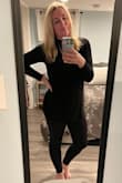 Such a cute top and I got so many compliments! Classic turtleneck with a surprise slit! - Bailey