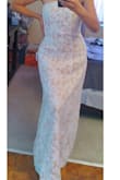 There are some negative reviews, but I bought this dress anyway, and it was the best thing I have ever done!! It is very elegant, the fabric gives a perfect fit. I will use it in my vow renewals. I can't believe I only paid $35.00!! Very happy with this dress!! - Cristiane G.