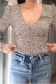 Perfect top for anything! I've been wanting something nice but casual and this is it! Prefer it tucked in. It's a little loose but I wouldn't size down. - Lindsey G.