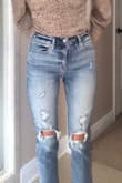 I love the way these look! Perfectly distressed and not too tight on my legs. The waist band is a little tight but maybe I should have went one size up. Overall, a great fit. Looser around my ankles. - Lindsey G.