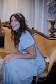 I wore it to a Bridgerton Theme Ball party and it was perfect. The material is soft, flowy, and elegant. I tend to prefer wrap dresses because I have a small waist, small bust and larger hips, thighs and butt. The small fit just right. I can't wait to wear it again. - Melissa S.