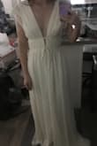 The quality is amazing for the price of this dress. Was very pleased with the lining and structure. Definitely a little long for me personally even with heels. I kind of wish the split was on the side instead of in the middle. Either way, a great dress choice for any formal occasion. Looks just like the picture! - Piper H.