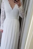Normally a medium in most clothing, but decided to go with a small based on mixed reviews. This dress fits perfectly!! Wanted a inexpensive dress for an elopement and this is more than what I expected! Love the top part and its super comfy! - Ciara K.