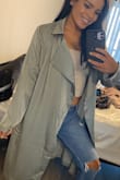 This is very classy and cozy looking. Although I did tie the waist tie in the back as I was not using it to keep it closed. When I reached for something it broke one of the loops off, so those are not very fastened in there and strong. It will be an easy fix any way. I would recommend this! - Kamyshi T.