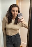 I love this sweater. I am usually small but the extra small fit perfectly. Cute for going out and looking polished while also casual. Very trendy color and cut. - Ariel H.