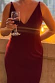 I got so many compliments when I wore this dress to a winter formal wedding. The material is stretchy so I could easily dance all night, but it's also thick and a bit on the heavy side so it hangs really nicely on the body. I wore 3-4 inch heels and had to hem this about 2-3 inches. I am so happy with this dress and since it's such a classic look I can wear to really any formal event in the future. - Hannah A.