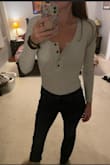 This bodysuit is comfortable and stretches out a bit after a few hours of wear, which is good because I'm long-waisted. There's room to pull it down and unbutton it for cleavage or pull up and button up for a conservative and comfy look under a flannel. - Molly B.