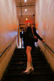 I usually am a solid medium, but based on the reviews I dozed down. It is a little short when I raise my hands but the overall fit is really cute. I'm very glad I went with the small. If you want an oversized look then size up. - Marteen C.