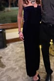 Love this jumpsuit. Looks exactly like the picture. The top doesn't stay up very well though so you may want tape. I also added a bralette to mine to cut down on cleavage. - Heidi M.