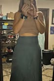 Not a skirt lover, but I really like this one! It makes you look slim in the belly area, then flows out nicely around your butt to give you good curves. Also comfy! I have a little belly pouch from my pregnancies and the panel at the top helped disguise that. - Courtney V.