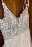 The only thing was the straps i had to adjust but it fits perfect! Its even prettier in person. The photos dont do justice! It made me change my wedding dress to this one! It fit and was comfortable! Love it!!!i got a size 4 - Ashlee M.