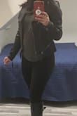This is a great staple jacket. I've worn it twice now since I've received it. At first, I thought the fit was a bit tight for my liking. I'm usually a M. I purchased a L to see the difference. The L I could wear a thicker sweater and had more space. If I wore a regular t-shirt, the arms were a bit looser. I ended up staying with the M for a more fitted look. I do work out so my lats are a little wider. I think the jacket is meant to be fitted so stick to your reg size, imo. The quality is also really nice. It's very versatile you can dress it up or down. - Daniela