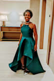 I bought a medium and it fit like a tailored glove. My husband was very impressed - the dress is absolutely stunning in person, it's very well made, and so much fun to wear! I received endless compliments all evening while we attended a Brian McKnight concert to kick off my 50th Birthday weekend. 

BONUS: It has pockets!! - Mia J.